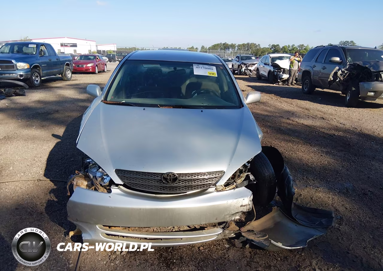 2004 Toyota Camry Le VIN:JTDBE30K340261853 - 12