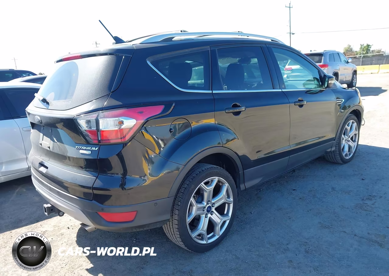 2018 Ford Escape Titanium VIN:1FMCU0J99JUA57088 - 4