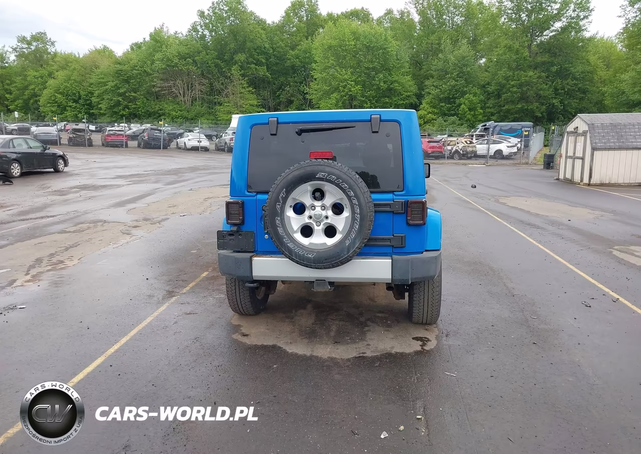 2011 Jeep Wrangler Unlimited Sahara VIN:1J4HA5H14BL588376 - 16