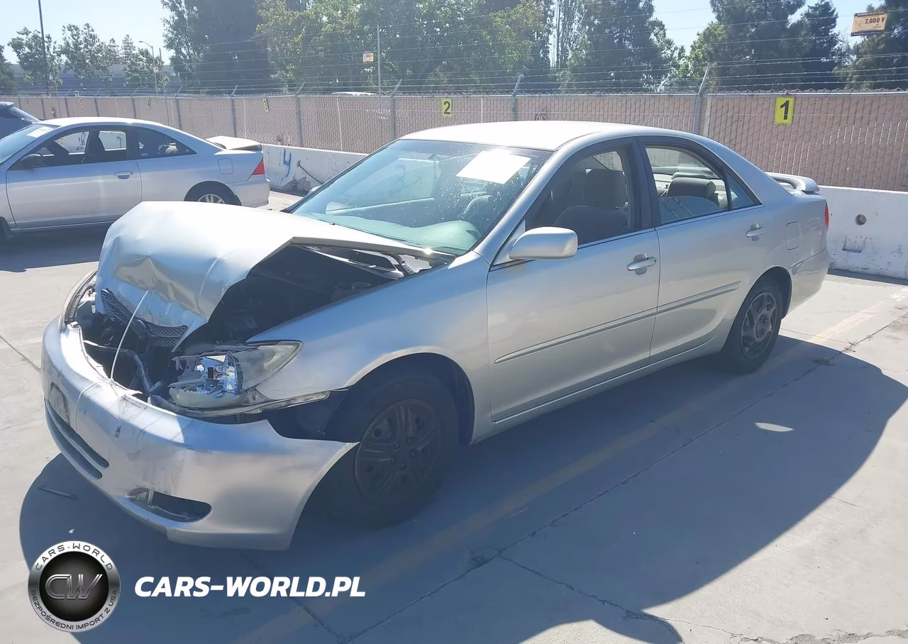 2002 Toyota Camry Le VIN:JTDBE32K520020323 - 2