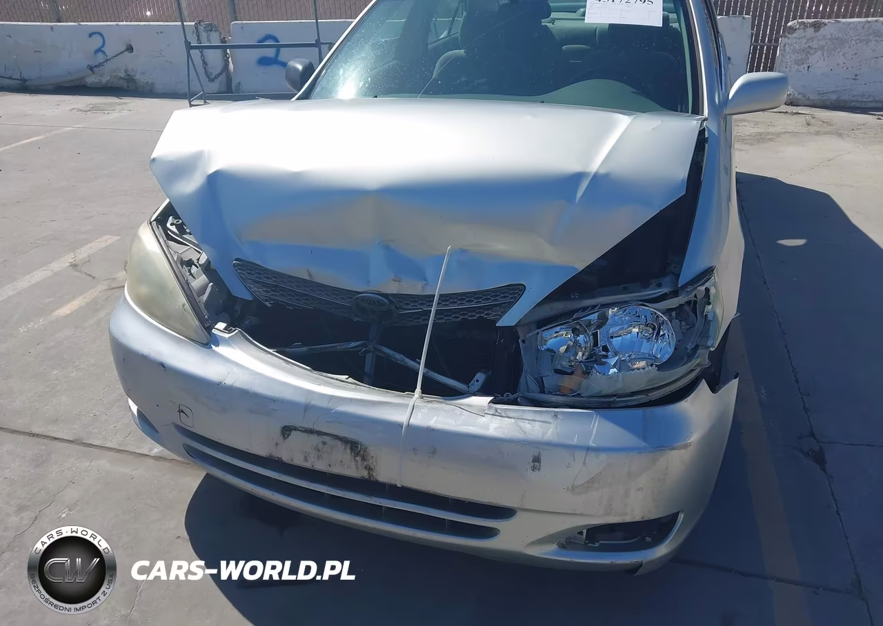 2002 Toyota Camry Le VIN:JTDBE32K520020323 - 6