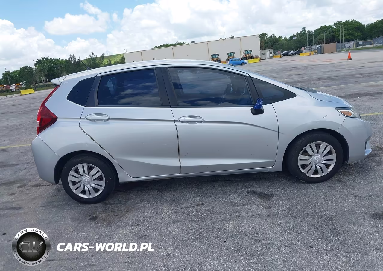 2015 Honda Fit Lx VIN:3HGGK5H58FM740716 - 13