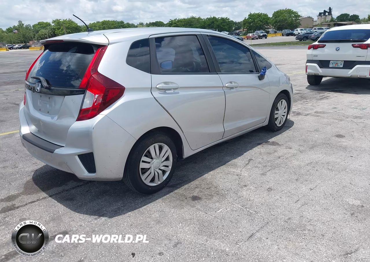 2015 Honda Fit Lx VIN:3HGGK5H58FM740716 - 4