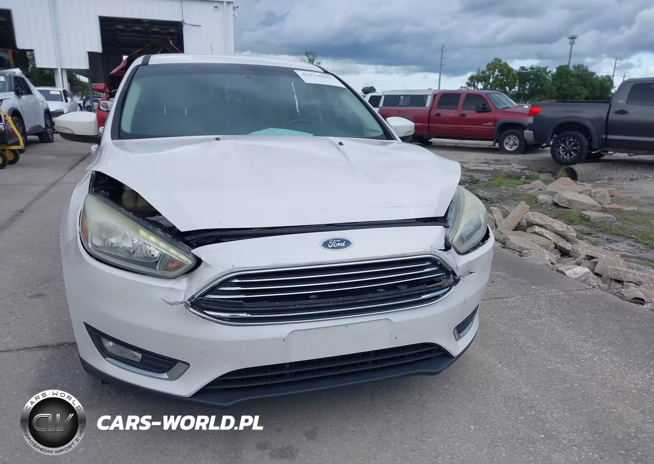 2016 Ford Focus Titanium VIN:1FADP3N23GL307041 - 12