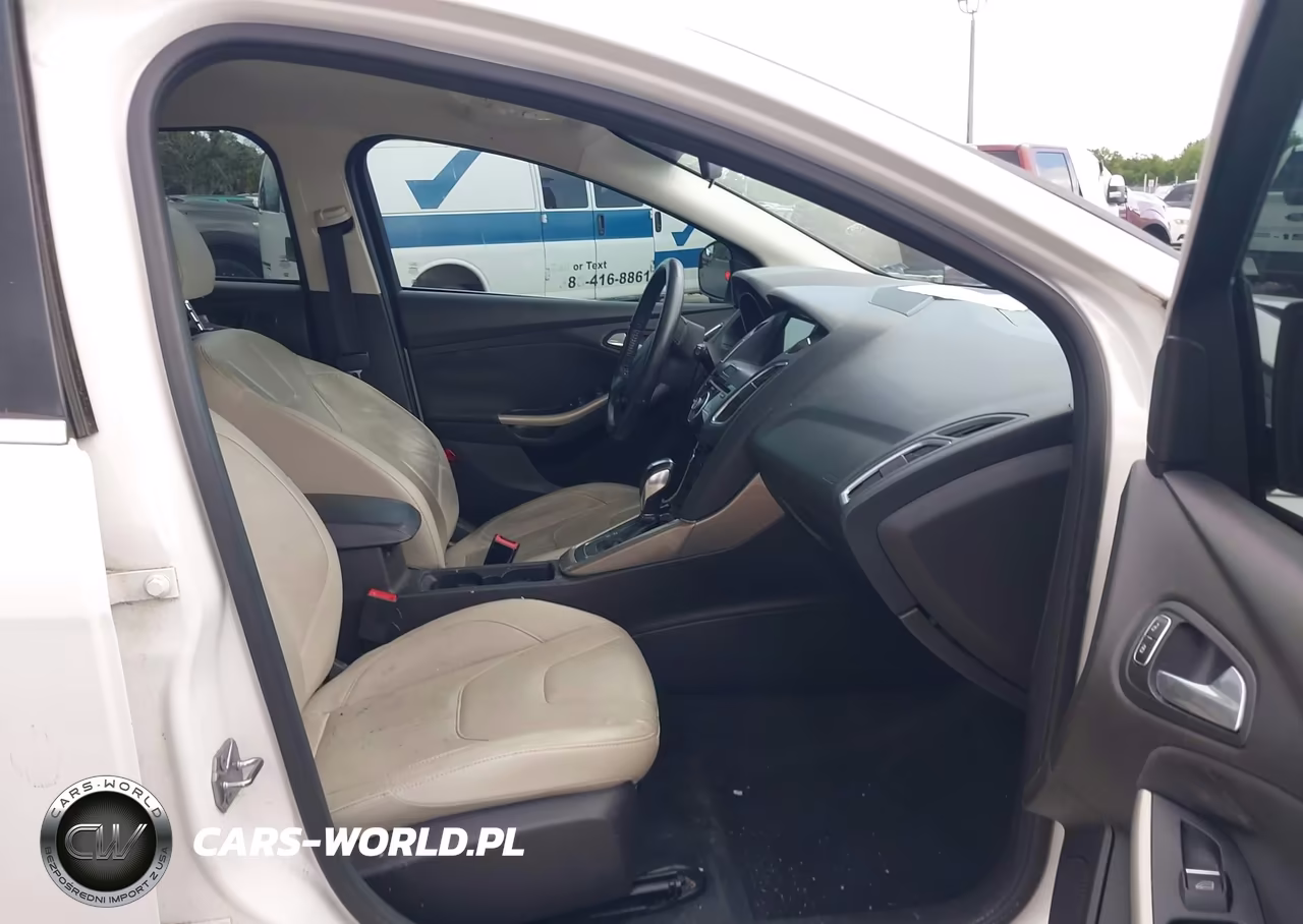 2016 Ford Focus Titanium VIN:1FADP3N23GL307041 - 5