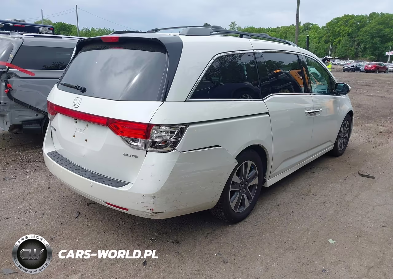 2014 Honda Odyssey Touring VIN:5FNRL5H95EB021370 - 4
