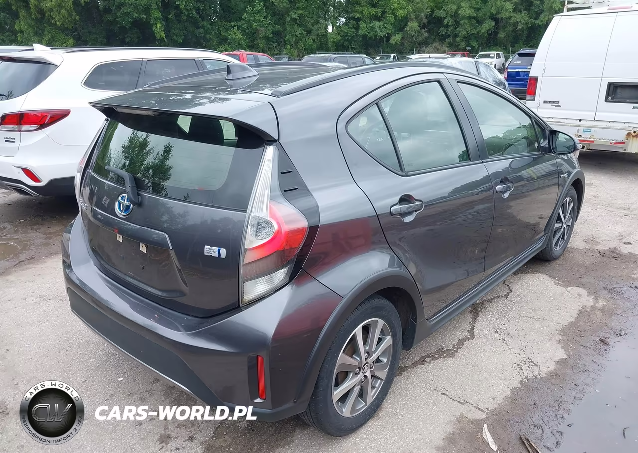 2018 Toyota Prius C Two VIN:JTDKDTB34J1607228 - 4