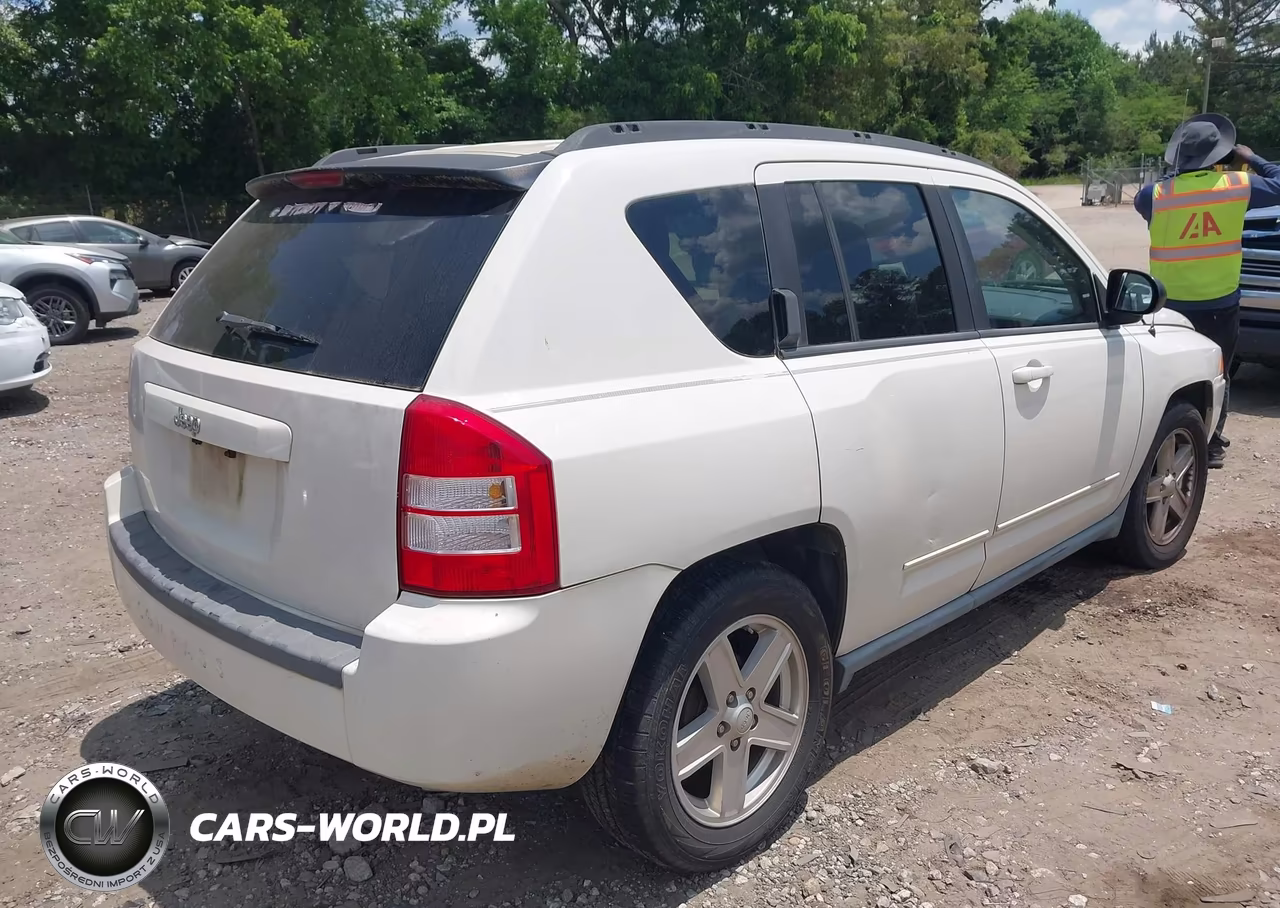 2010 Jeep Compass Sport VIN:1J4NT4FB4AD585490 - 4