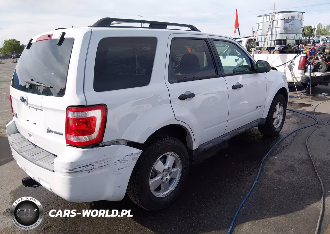 2010 Ford Escape Hybrid Limited VIN:1FMCU5K32AKC79636 - 4