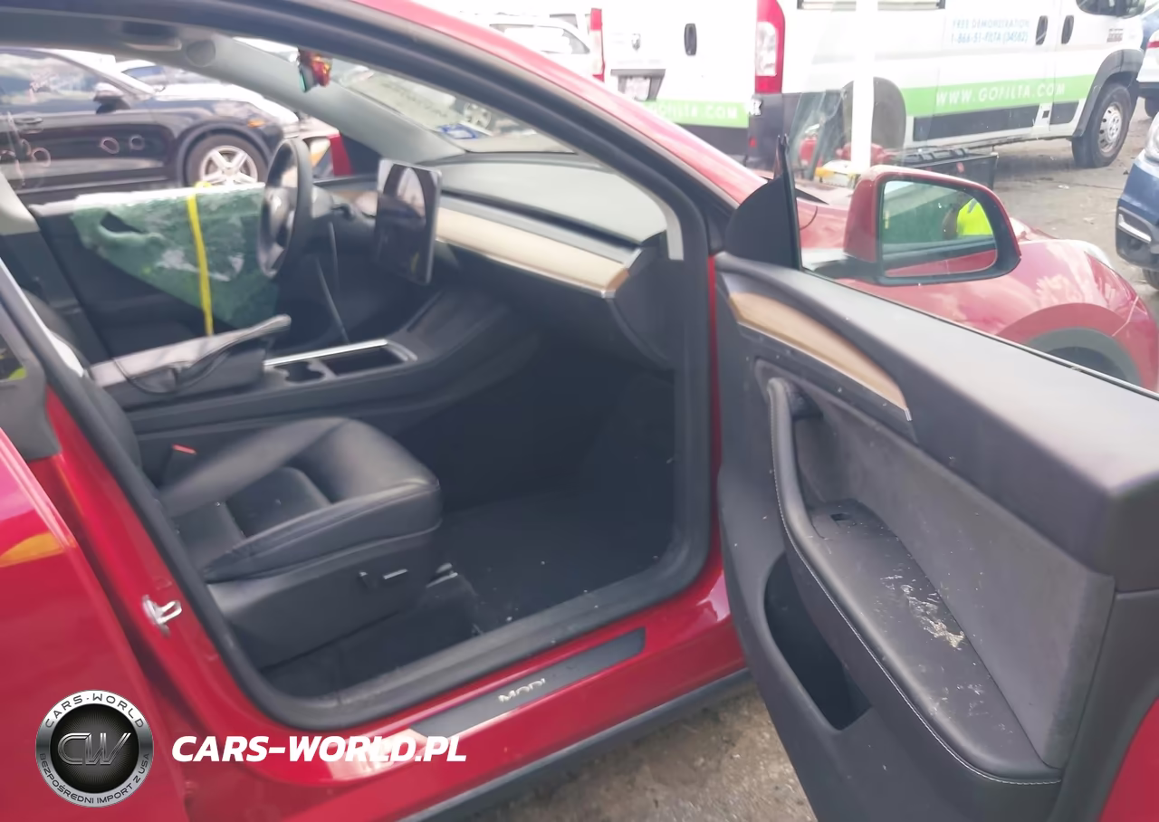 2023 Tesla Model Y VIN:7SAYGDEE7PA129682 - 5