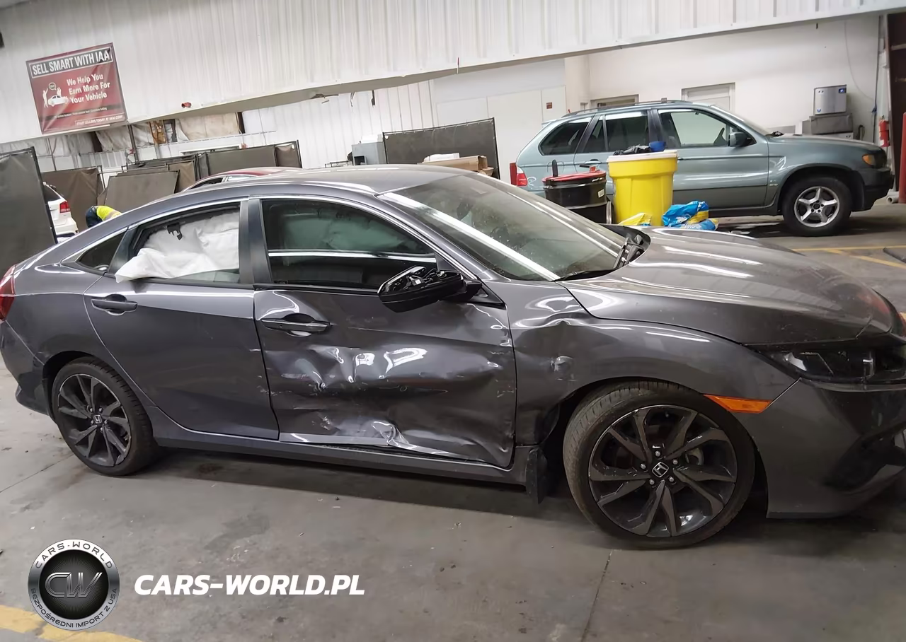 2020 Honda Civic Sport VIN:19XFC2F86LE000574 - 13