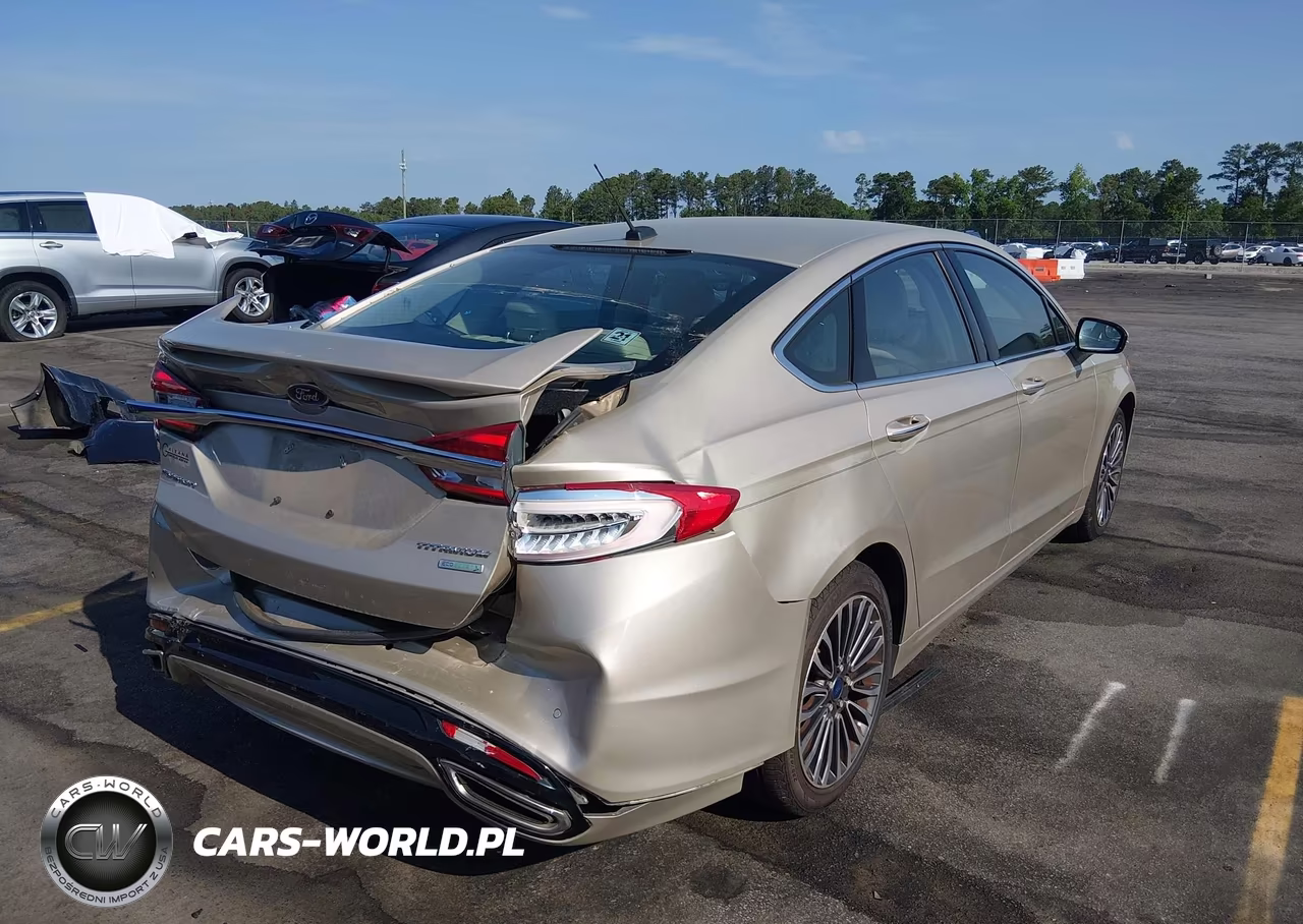 2017 Ford Fusion Titanium VIN:3FA6P0K97HR262536 - 4