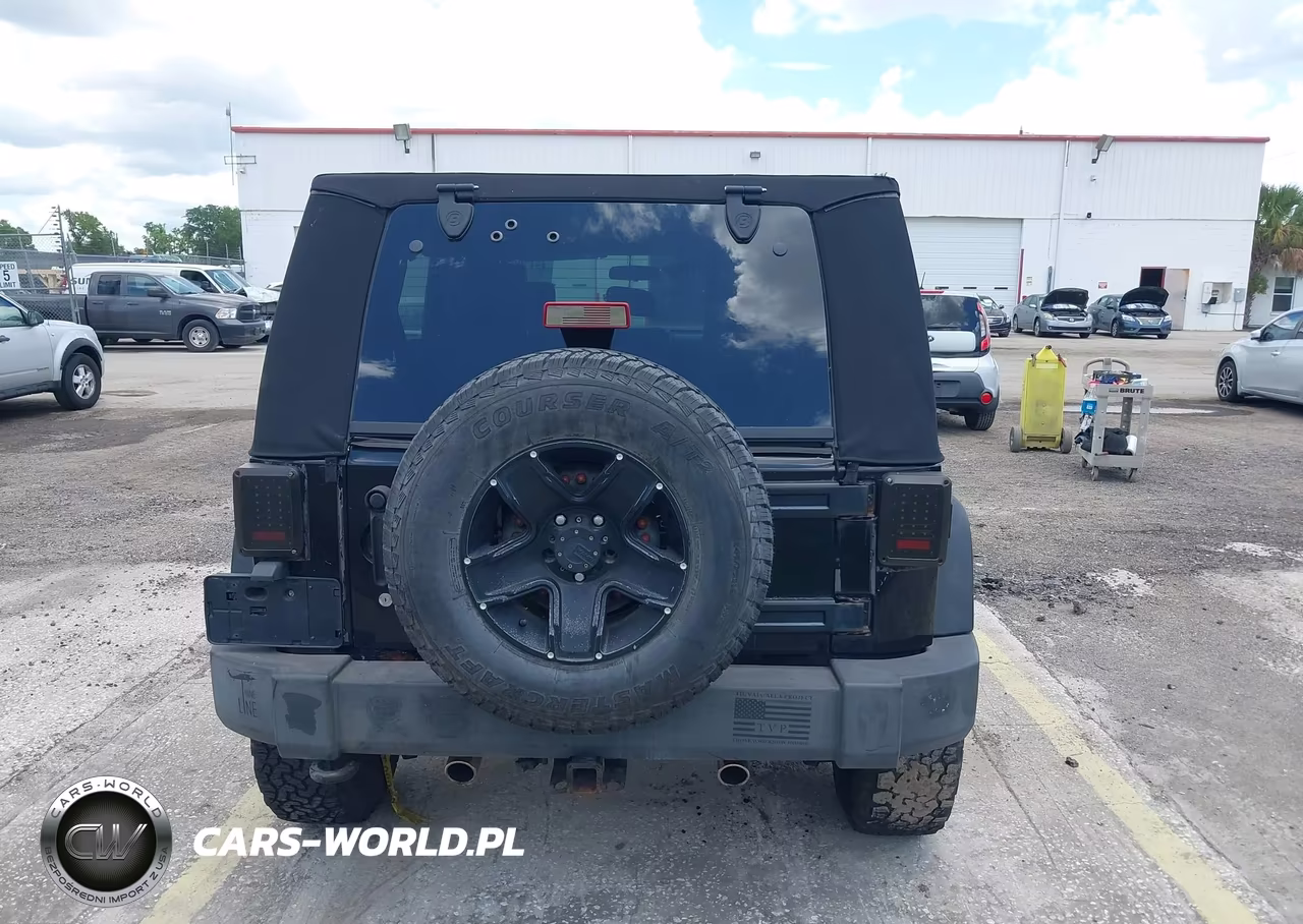 2010 Jeep Wrangler Unlimited Sport VIN:1J4BA3H15AL175813 - 16