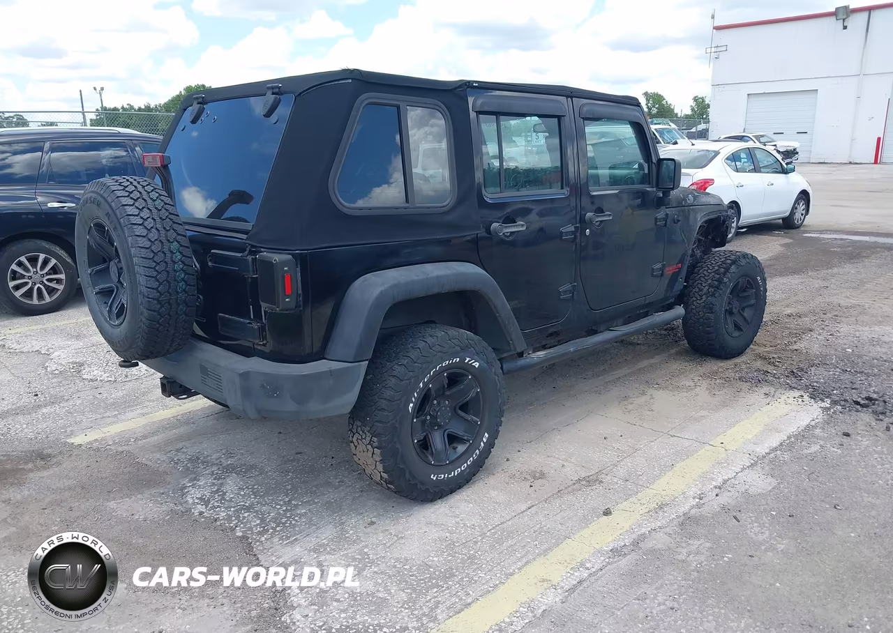 2010 Jeep Wrangler Unlimited Sport VIN:1J4BA3H15AL175813 - 4