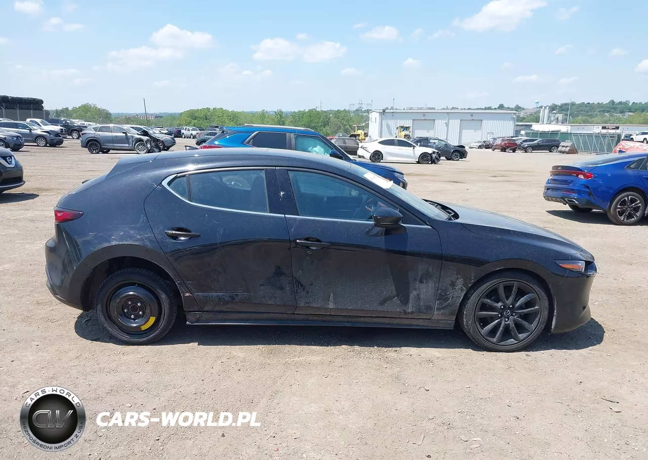 2021 Mazda Mazda3 Premium VIN:JM1BPAML7M1340065 - 14