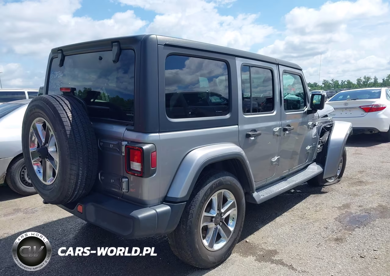2019 Jeep Wrangler Unlimited Sahara 4X4 VIN:1C4HJXEN5KW516335 - 4