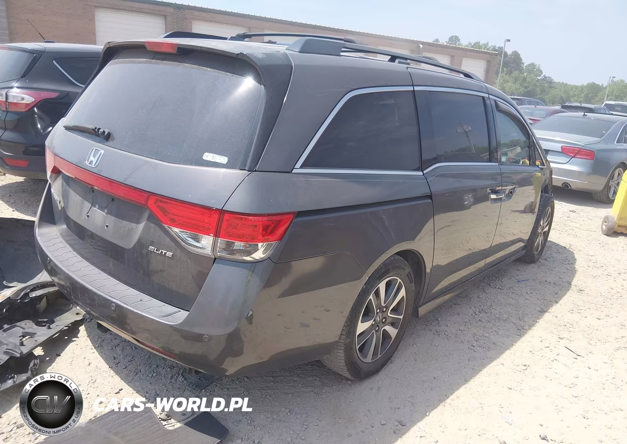2014 Honda Odyssey Touring-Touring Elite VIN:5FNRL5H90EB105029 - 4