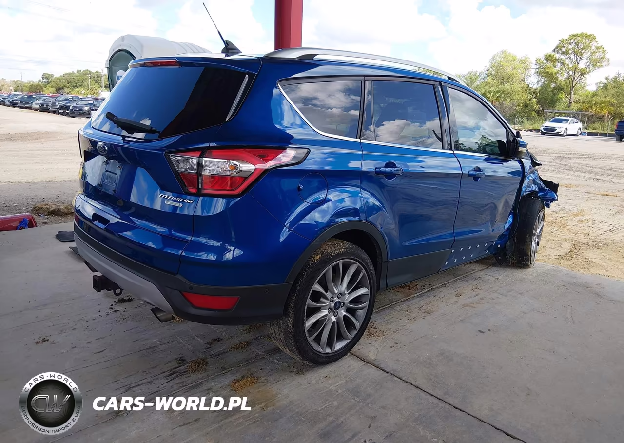 2018 Ford Escape Titanium VIN:1FMCU0J94JUC73642 - 4