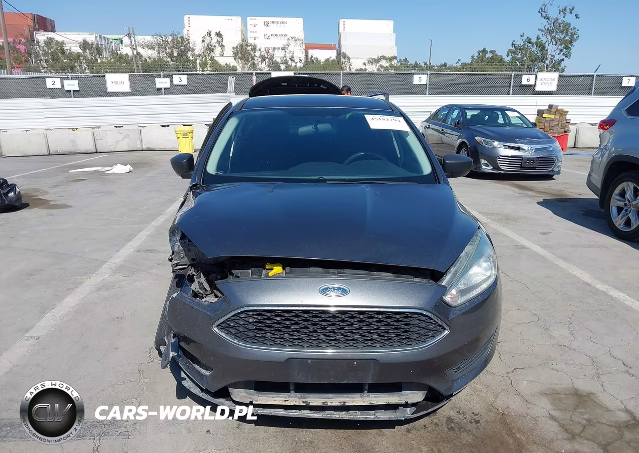 2018 Ford Focus S VIN:1FADP3E20JL304850 - 13