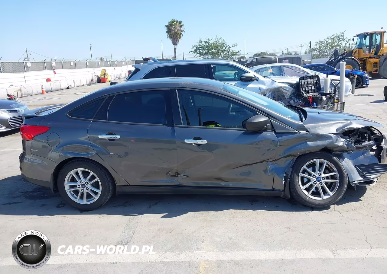 2018 Ford Focus S VIN:1FADP3E20JL304850 - 14