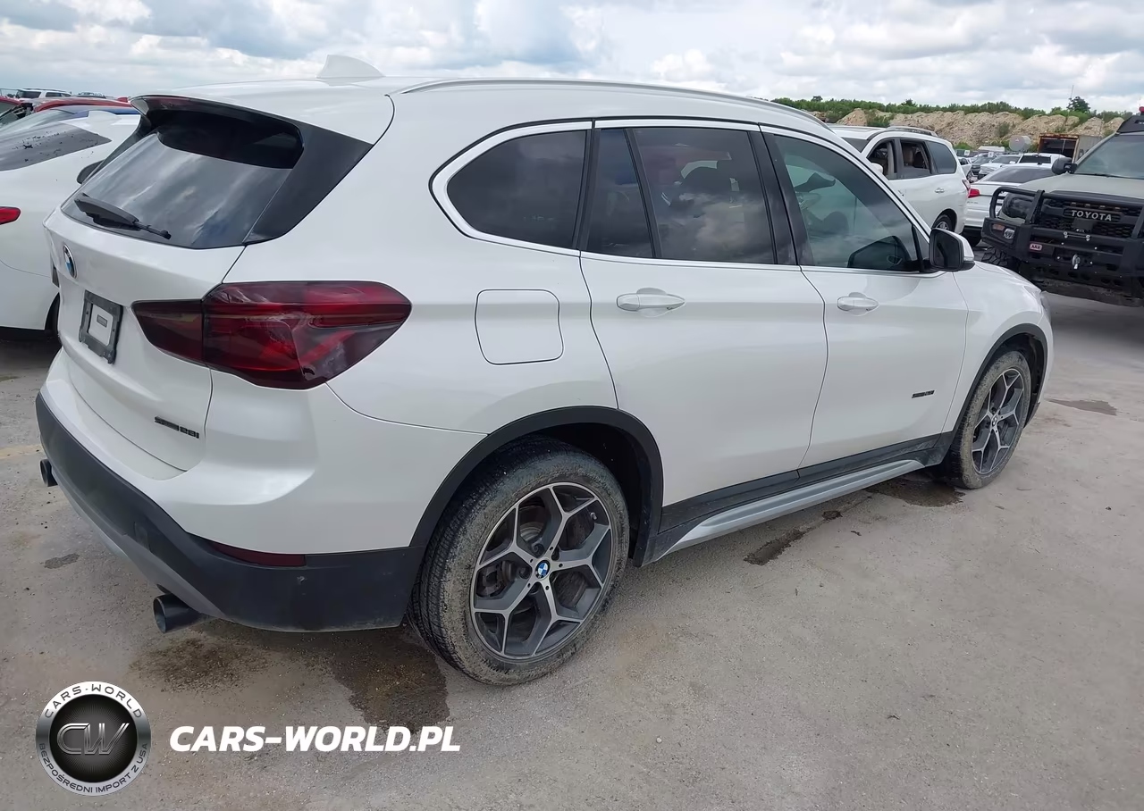 2018 BMW X1 Sdrive28I VIN:WBXHU7C32J5H42593 - 4