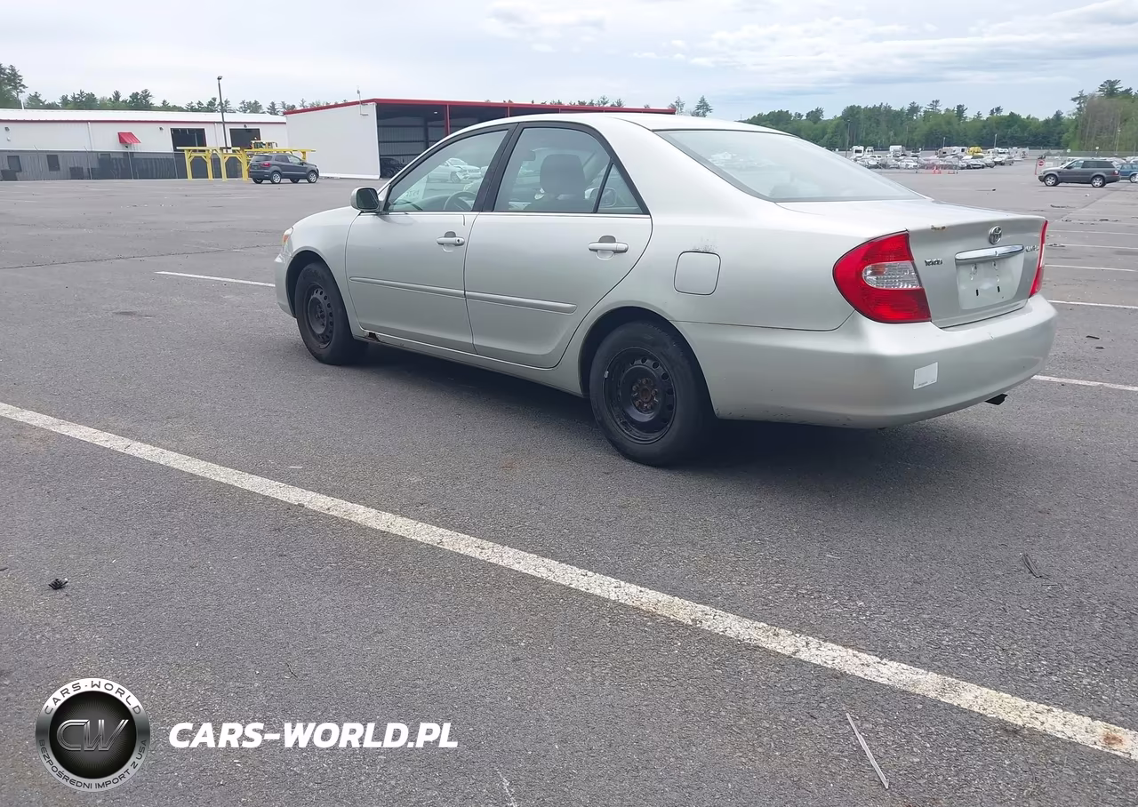 2002 Toyota Camry Le VIN:JTDBE32K720086176 - 3