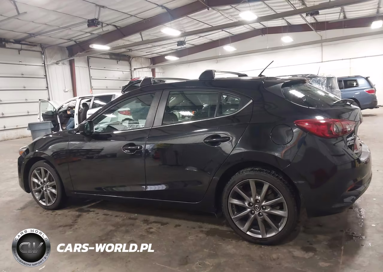 2018 Mazda Mazda3 Touring VIN:3MZBN1L31JM207496 - 14