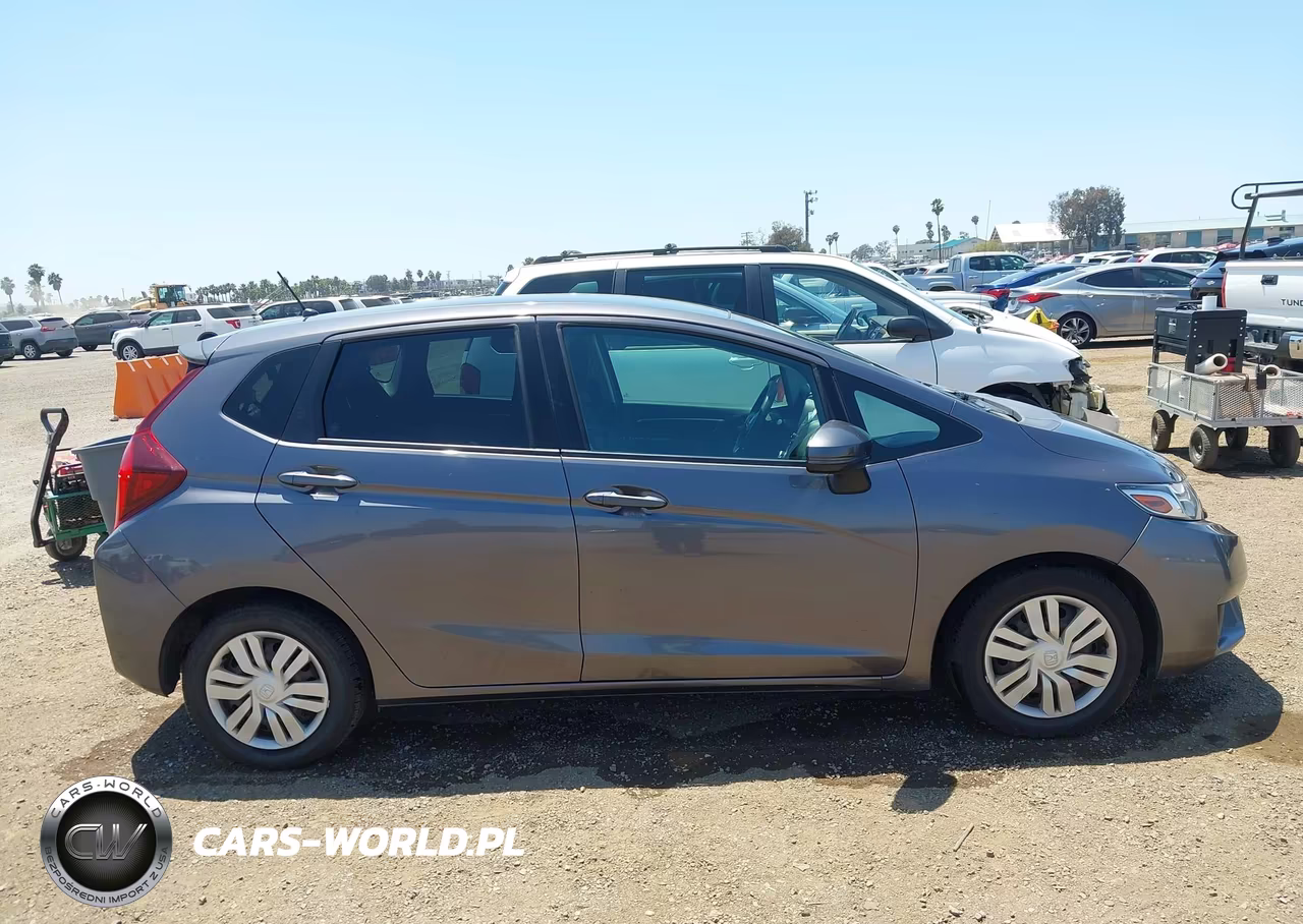 2015 Honda Fit Lx VIN:3HGGK5H51FM725023 - 13