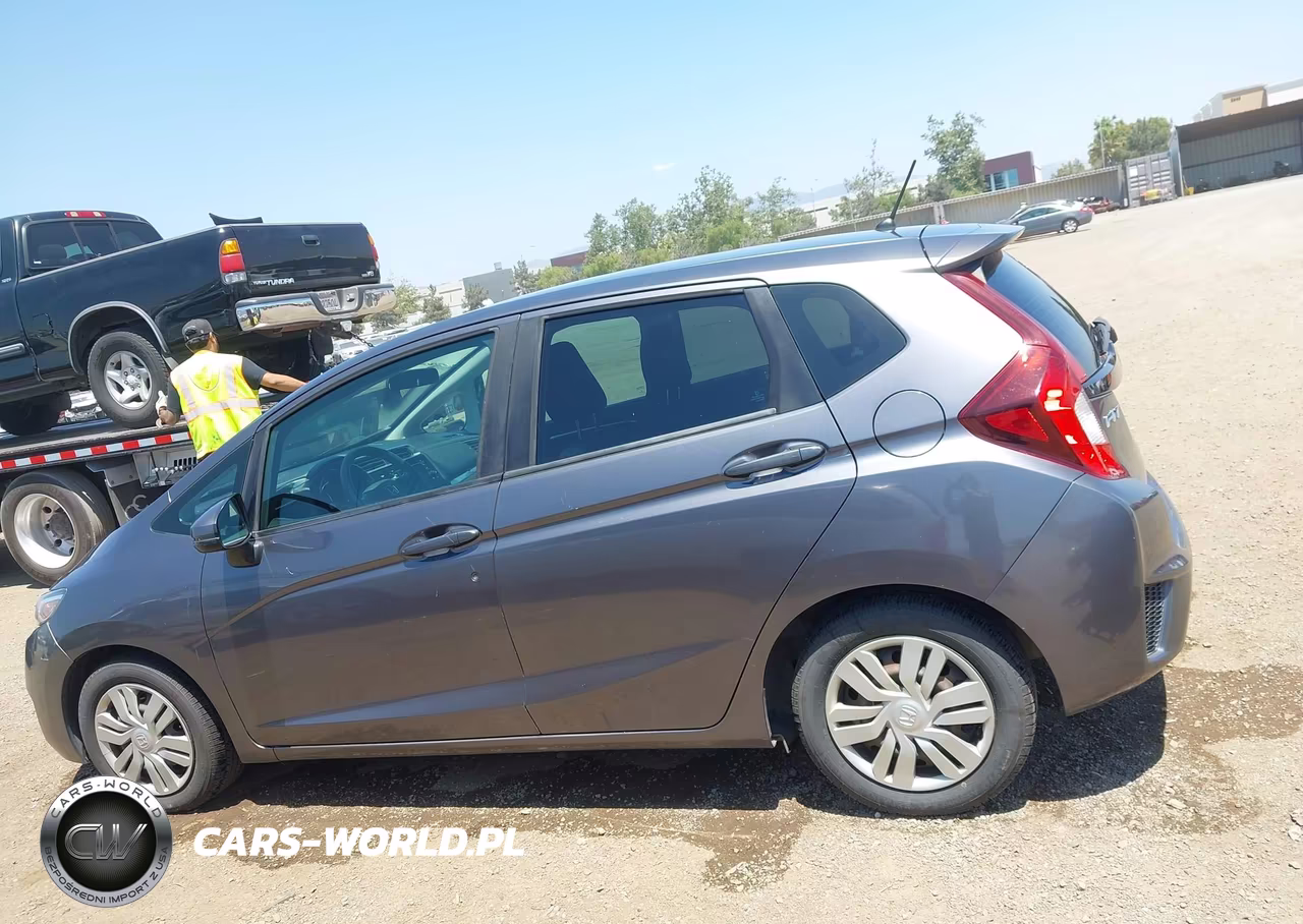 2015 Honda Fit Lx VIN:3HGGK5H51FM725023 - 14