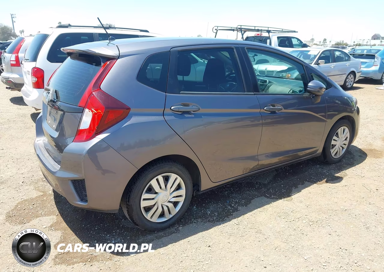 2015 Honda Fit Lx VIN:3HGGK5H51FM725023 - 4
