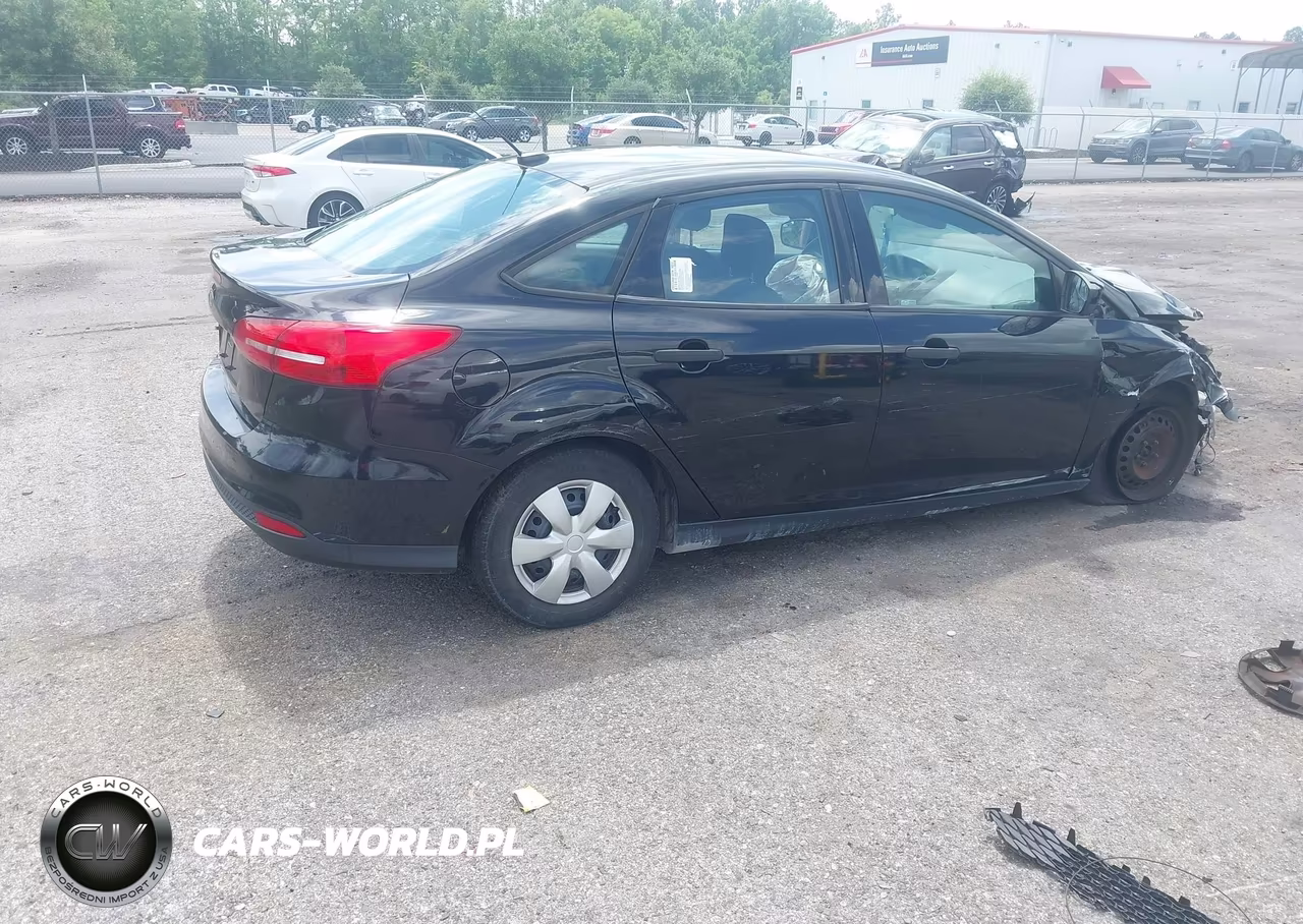 2017 Ford Focus S VIN:1FADP3E24HL219049 - 4