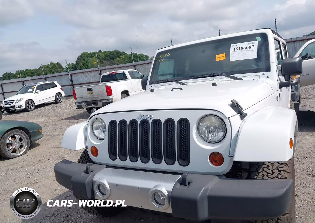 2011 Jeep Wrangler Unlimited Sahara VIN:1J4BA5H11BL627186 - 12
