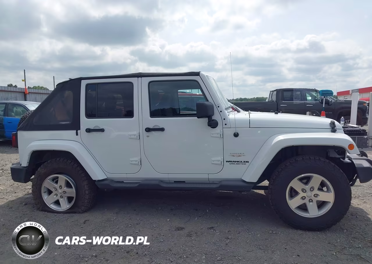 2011 Jeep Wrangler Unlimited Sahara VIN:1J4BA5H11BL627186 - 13
