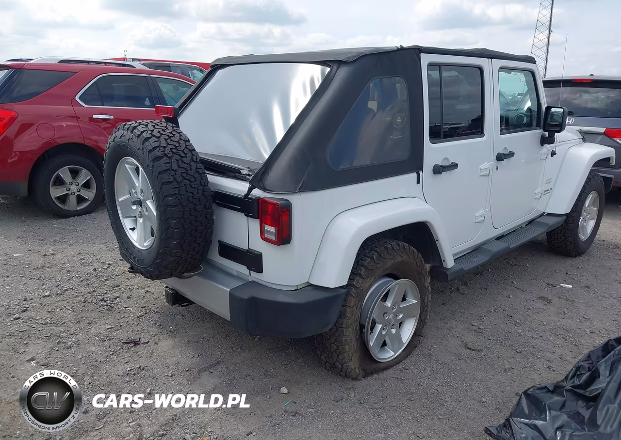 2011 Jeep Wrangler Unlimited Sahara VIN:1J4BA5H11BL627186 - 4