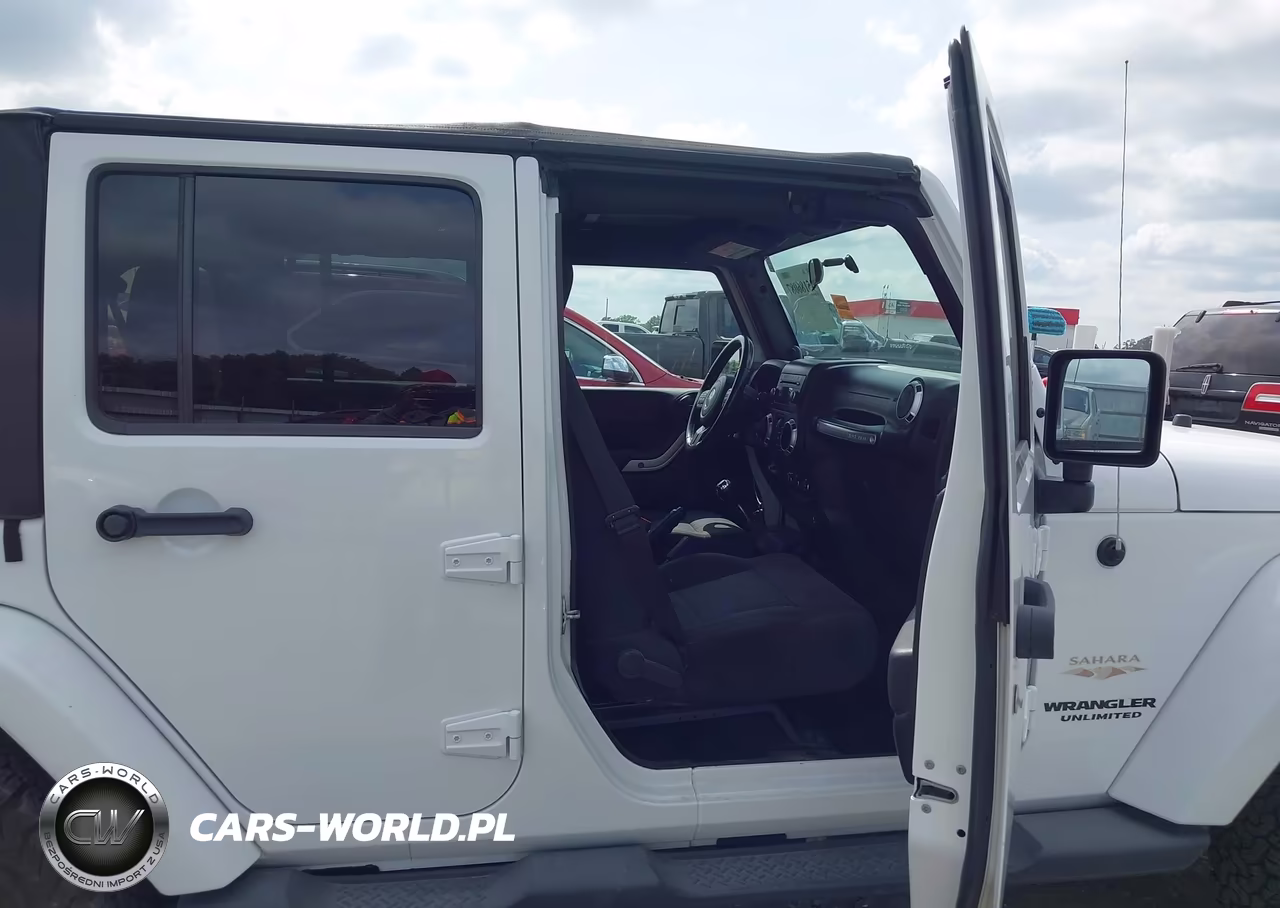 2011 Jeep Wrangler Unlimited Sahara VIN:1J4BA5H11BL627186 - 5