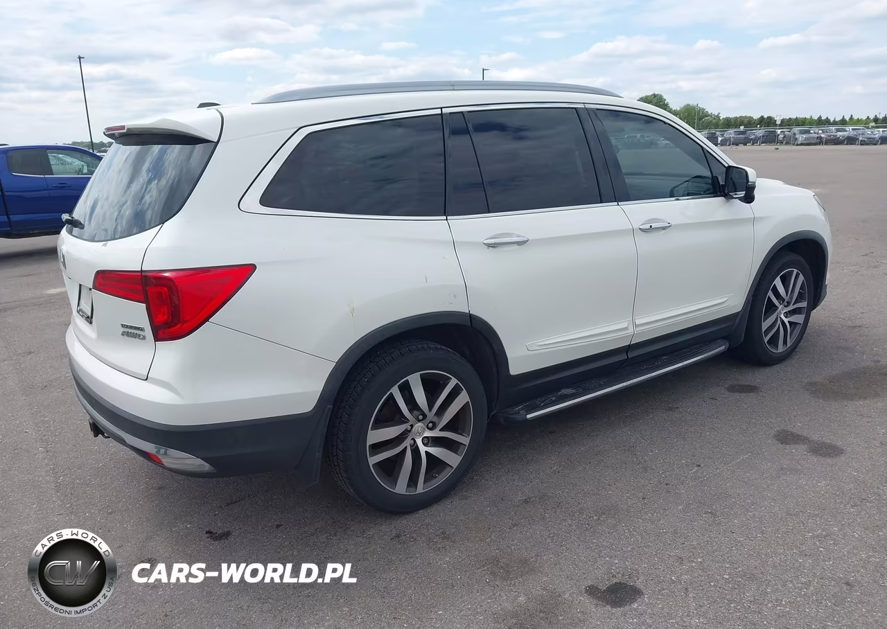 2016 Honda Pilot Touring VIN:5FNYF6H99GB042573 - 4