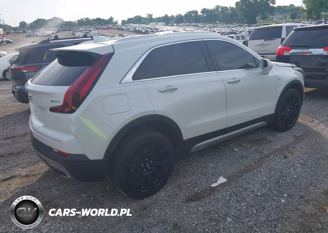 2019 Cadillac Xt4 Premium Luxury VIN:1GYFZCR4XKF143104 - 4
