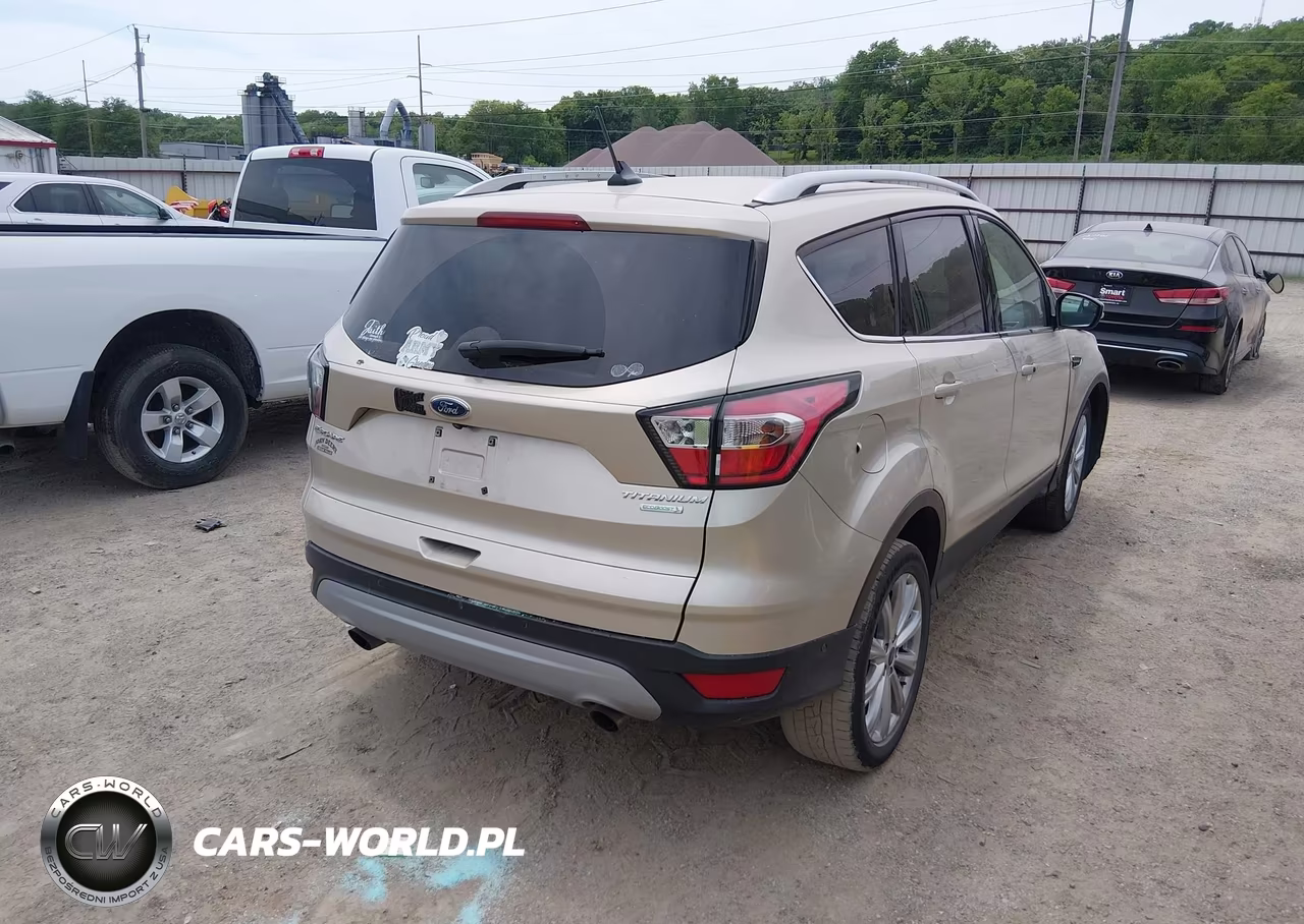 2018 Ford Escape Titanium VIN:1FMCU0J91JUA52628 - 4