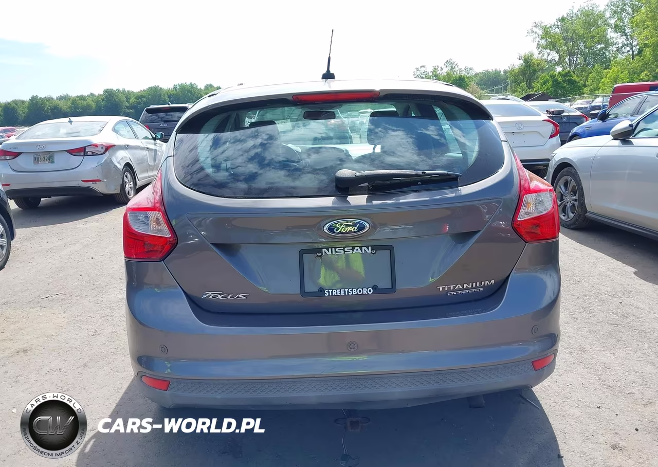 2012 Ford Focus Titanium VIN:1FAHP3N24CL366238 - 16