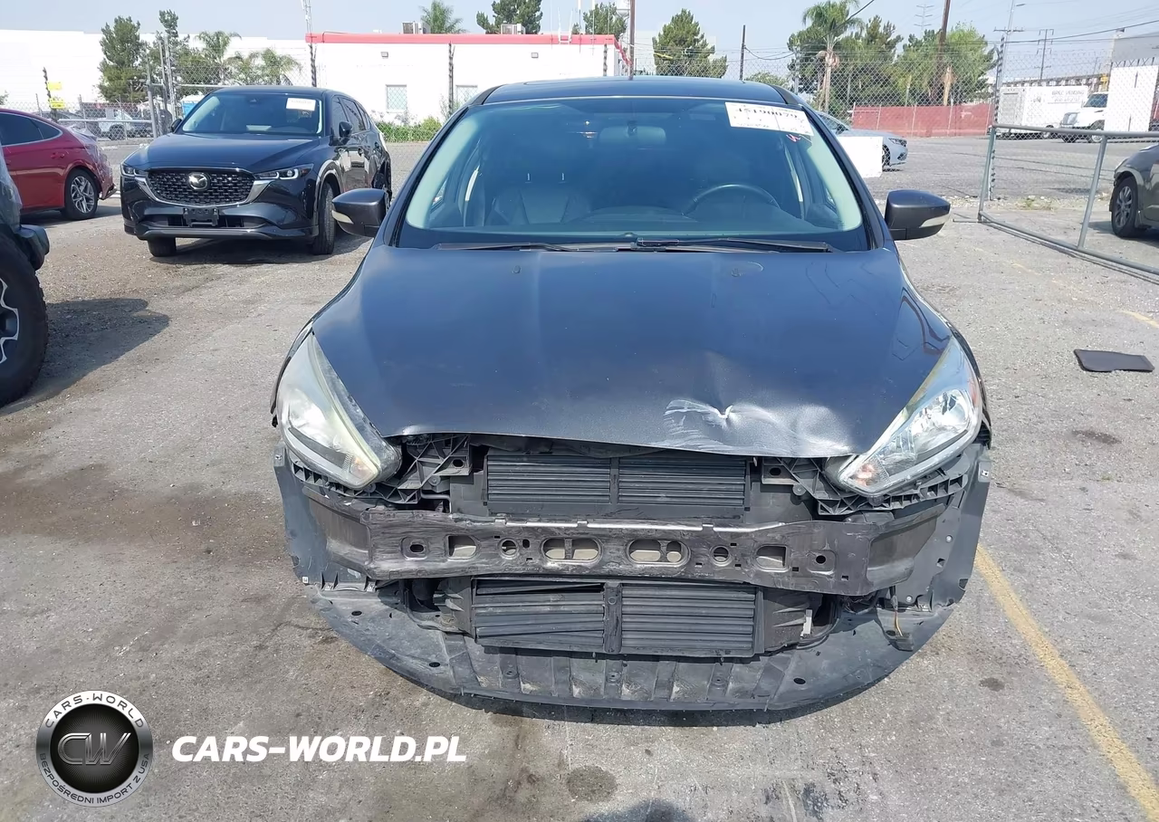 2017 Ford Focus Titanium VIN:1FADP3J28HL245627 - 12