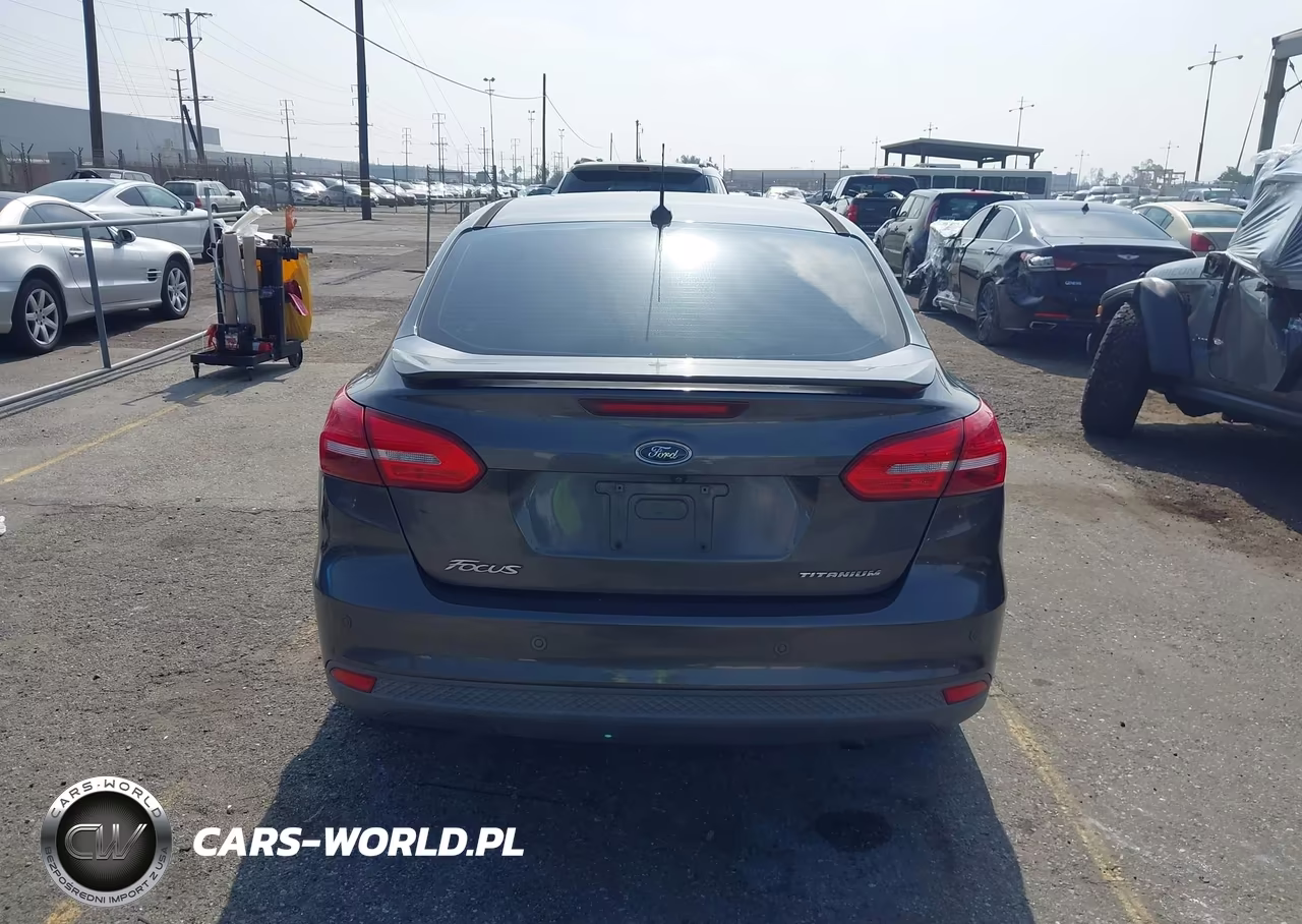 2017 Ford Focus Titanium VIN:1FADP3J28HL245627 - 16