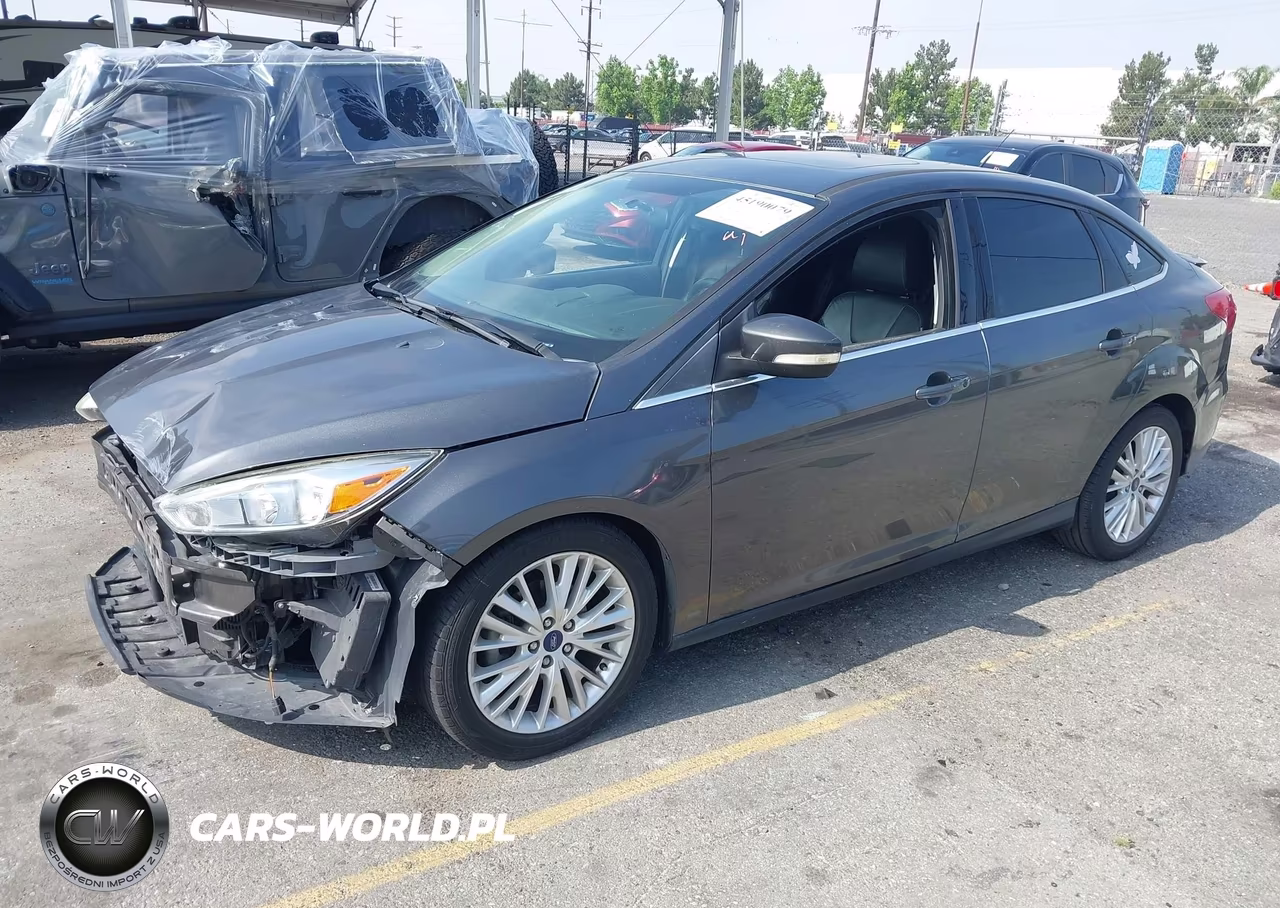2017 Ford Focus Titanium VIN:1FADP3J28HL245627 - 2