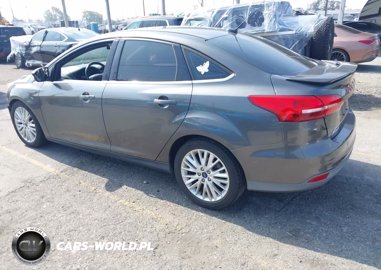 2017 Ford Focus Titanium VIN:1FADP3J28HL245627 - 3