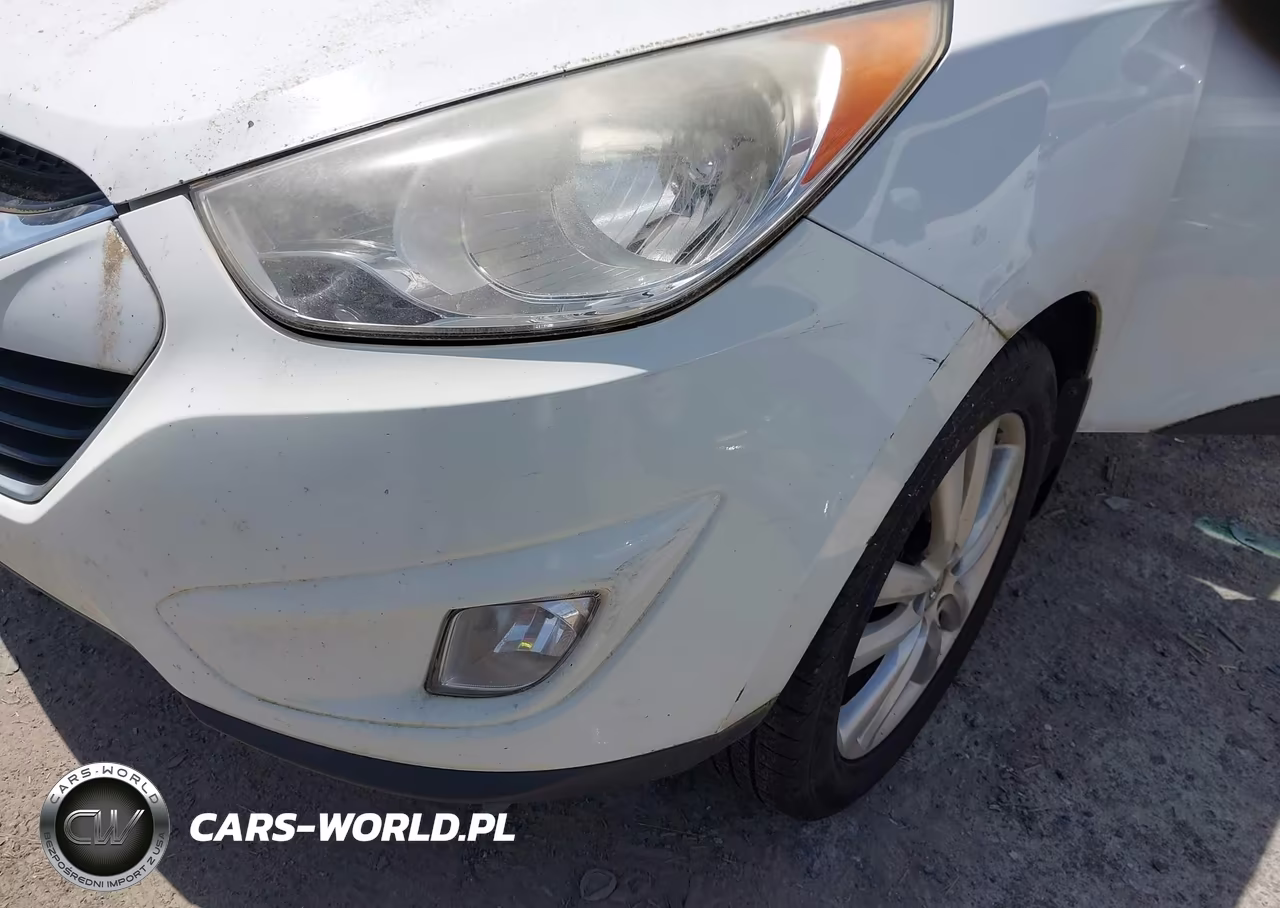 2012 Hyundai Tucson Limited VIN:KM8JUCAC9CU537574 - 12