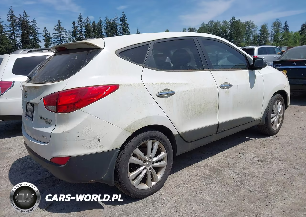 2012 Hyundai Tucson Limited VIN:KM8JUCAC9CU537574 - 4