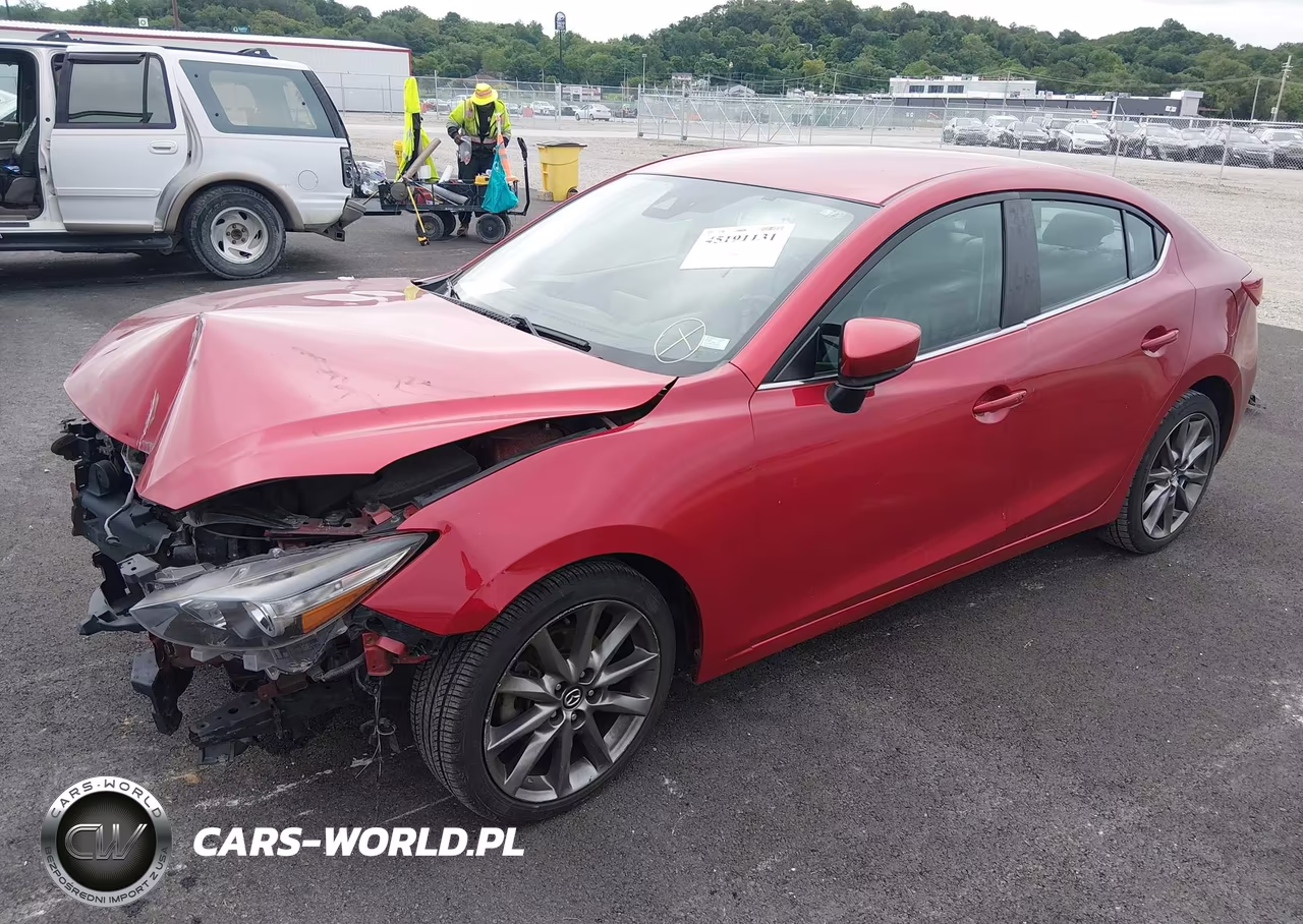 2018 Mazda Mazda3 Touring VIN:3MZBN1V3XJM209941 - 2