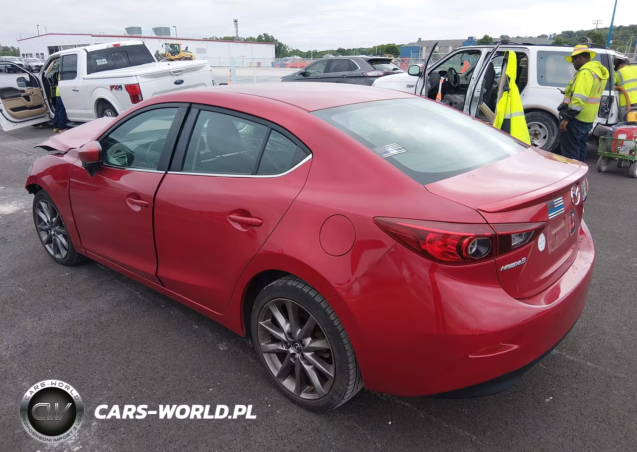 2018 Mazda Mazda3 Touring VIN:3MZBN1V3XJM209941 - 3