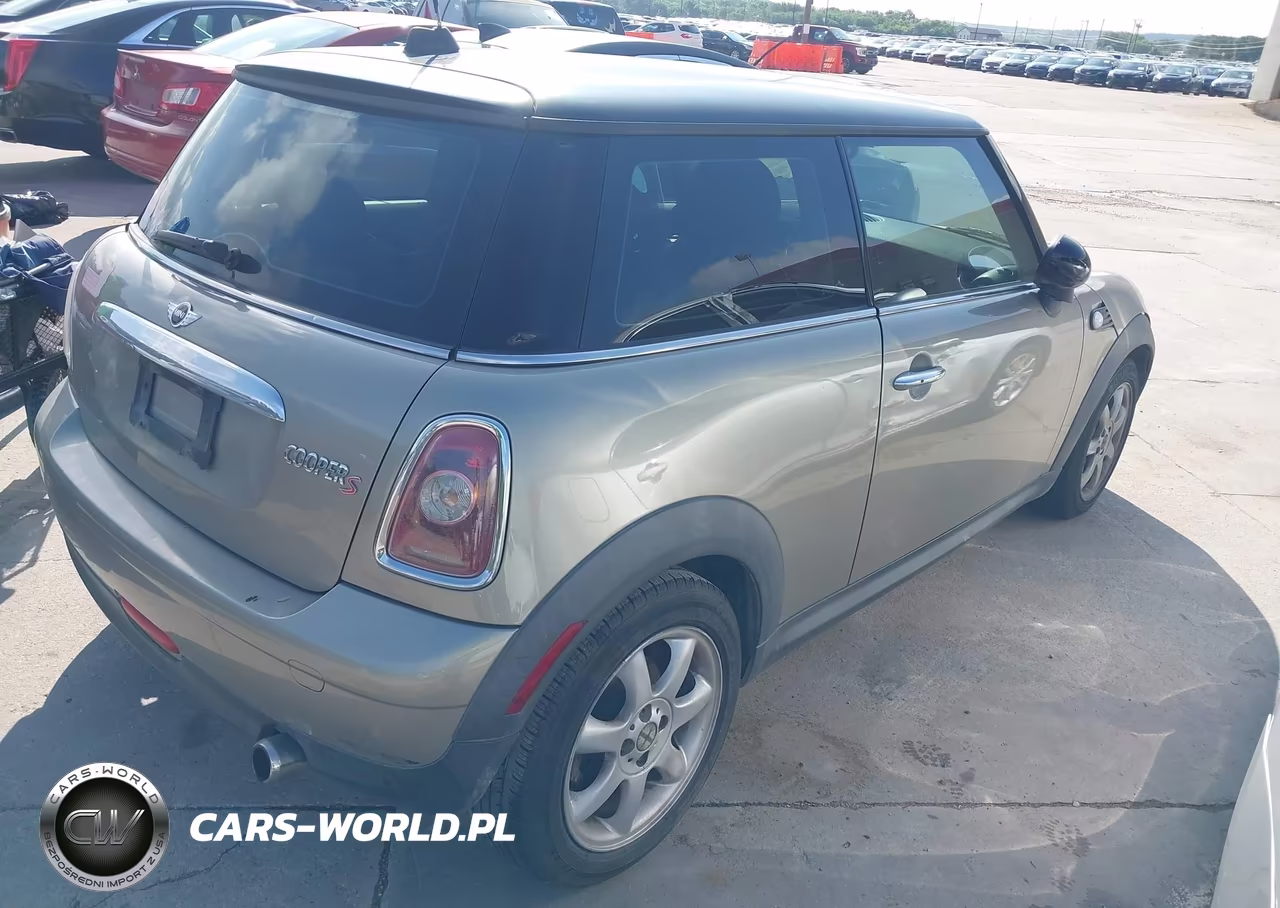 2009 Mini Cooper VIN:WMWMF33509TW76918 - 4