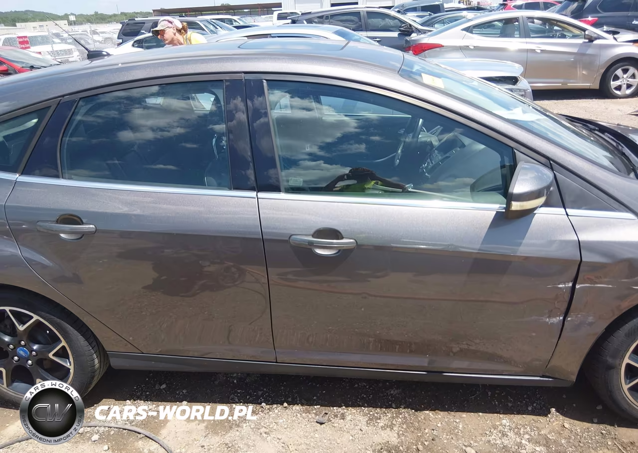 2012 Ford Focus Titanium VIN:1FAHP3N20CL236036 - 13