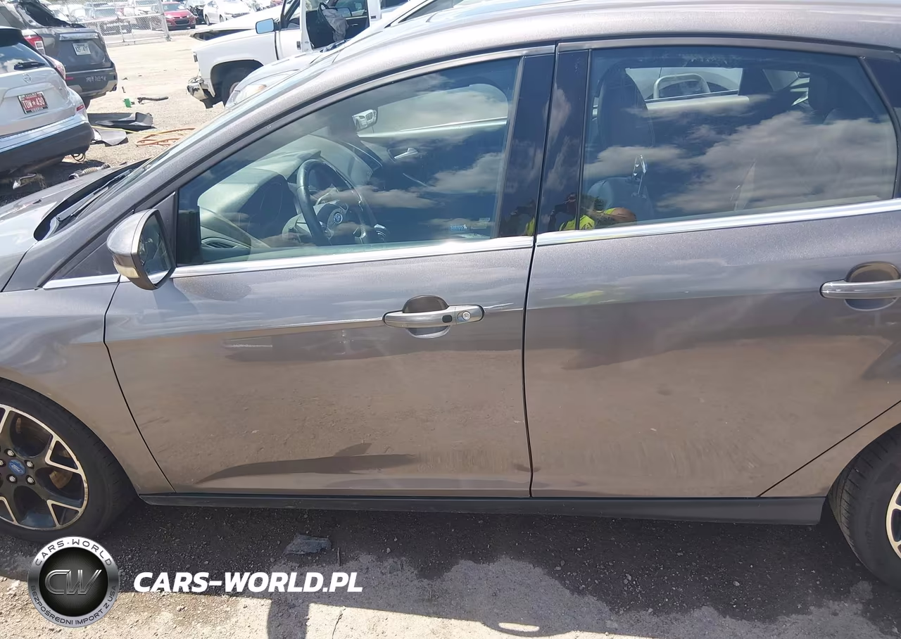 2012 Ford Focus Titanium VIN:1FAHP3N20CL236036 - 14